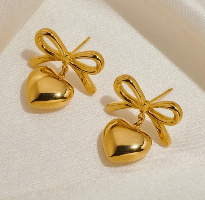 Bow drop heart earnings